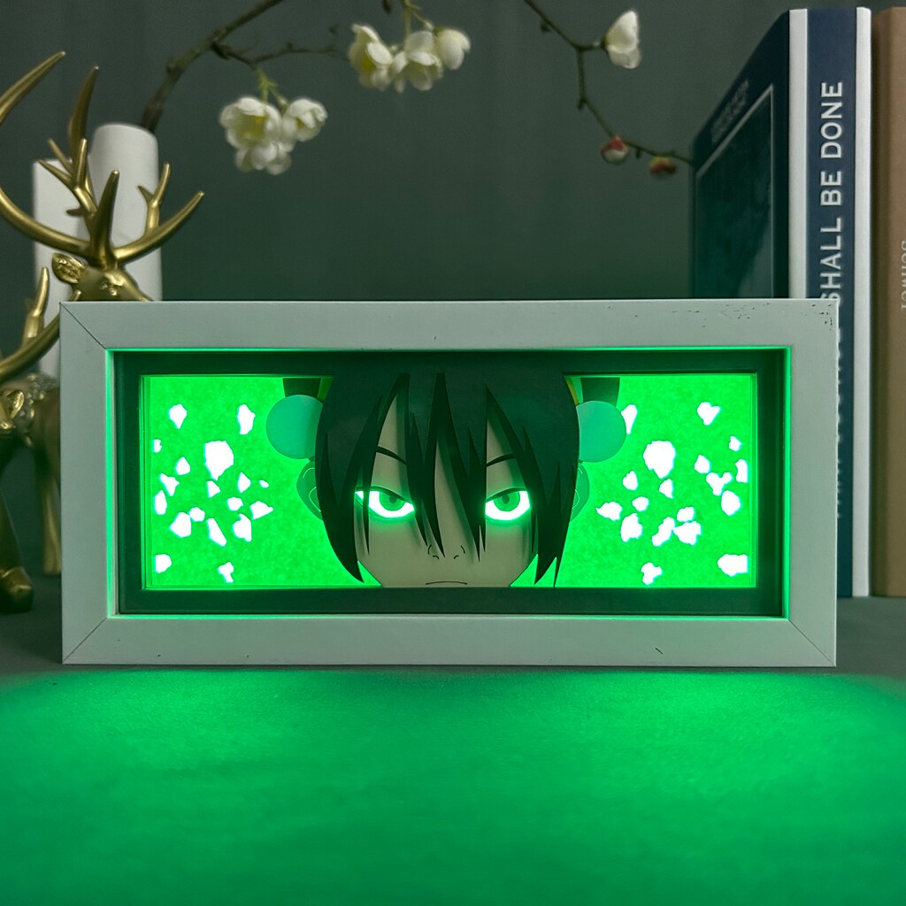 Layered cut paper lamp featuring Toph Beifong on white light setting