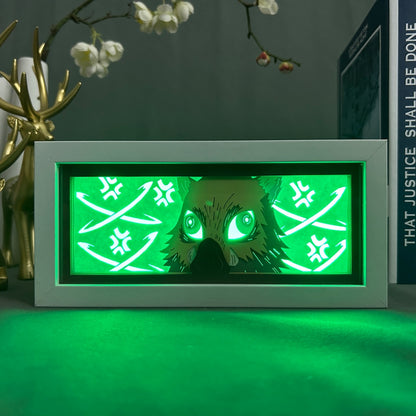 Layered cut paper lamp featuring Inosuke Hashibira on green light setting