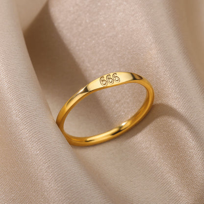 Gold-plated signet ring engraved with 666