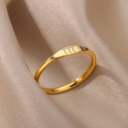 Gold-plated signet ring engraved with 777