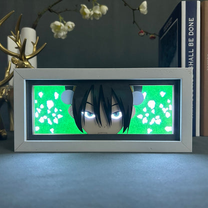 Layered cut paper lamp featuring Toph Beifong on white light setting